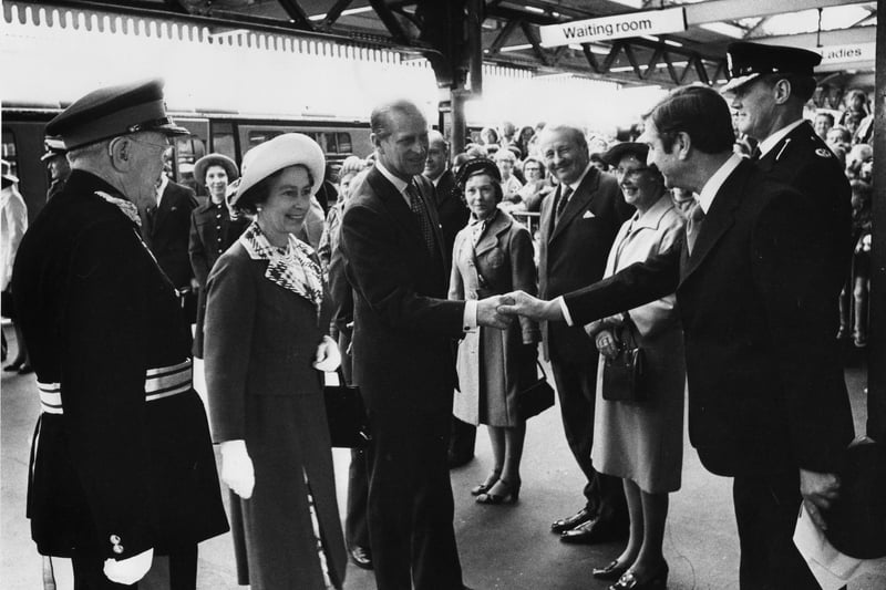 Mr Keith Ricketts, Station Manager, presented Queen Elizabeth and the Duke of Edinburgh at Portsmouth Harbour Station 1977.