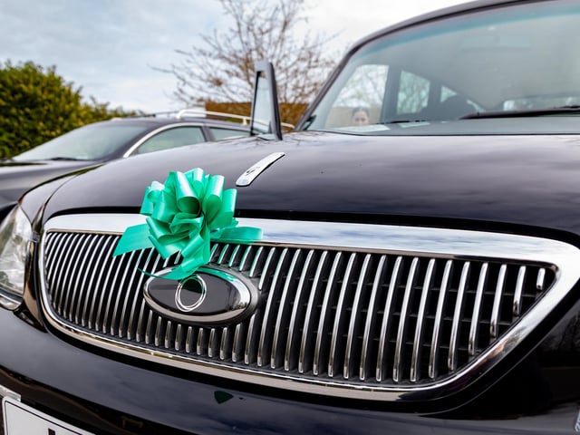 Vehicles in the funeral procession were decorated with a green ribbon, referencing Jax's nickname "The Little Frog". Picture: Mike Cooter (160324)