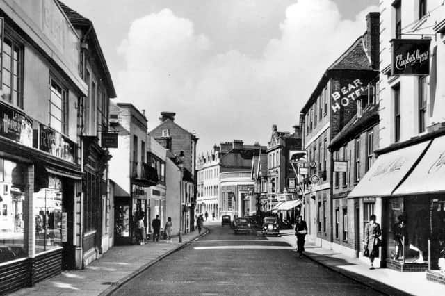East Street, Havant. Ladies hairdressers and Barclays Bank on the left, with the Bear Hotel, the Elizabethan bar and Elizabeth Myers Ltd on the right. Picture: Paul Costen collection