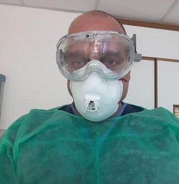 Nurse John Arnell receiving treatment for bowel cancer at Queen Alexandra Hospital.