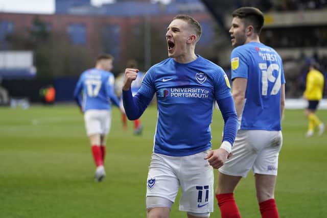 Ronan Curtis celebrates after scoring in the controversial 3-2 defeat at Oxford United - but is suspended for the Fratton Park rematch. Picture: Jason Brown/ProSportsImages