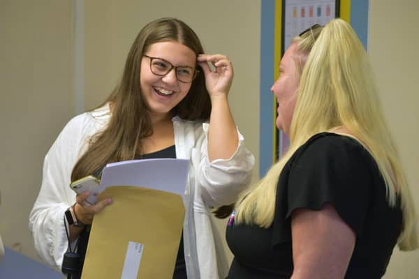 Smiles all around as this pupil picks up her grades at Fareham Academy