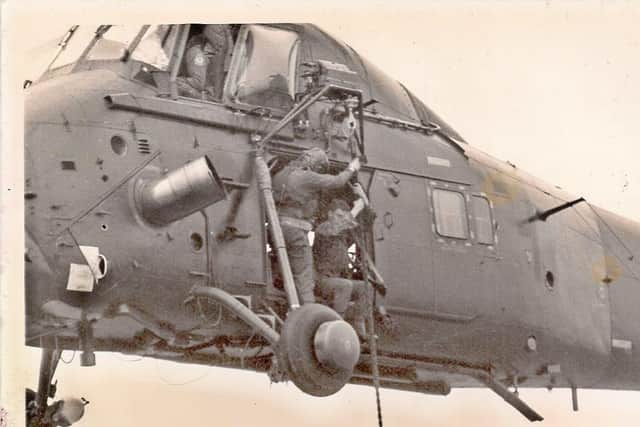 Ian Tennant, pictured rappelling from a helicopter during his basic training with the Royal Marines