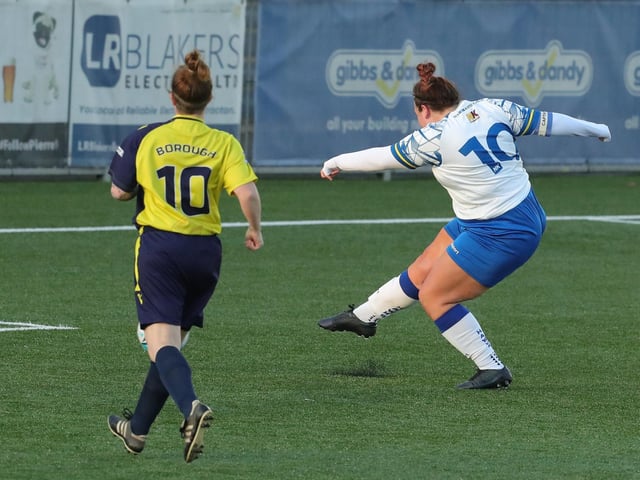 Chloe Dark scores Hawks' opener. Picture by Dave Haines