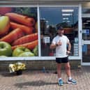 Chris Wilby outside a One Stop store.