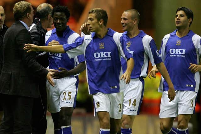 Pompey boss Harry Redknapp, left, with Benjani, Gary O'Neil, Matt Taylor and Dejan Stefanovic. Picture: Matthew Lewis/Getty Images