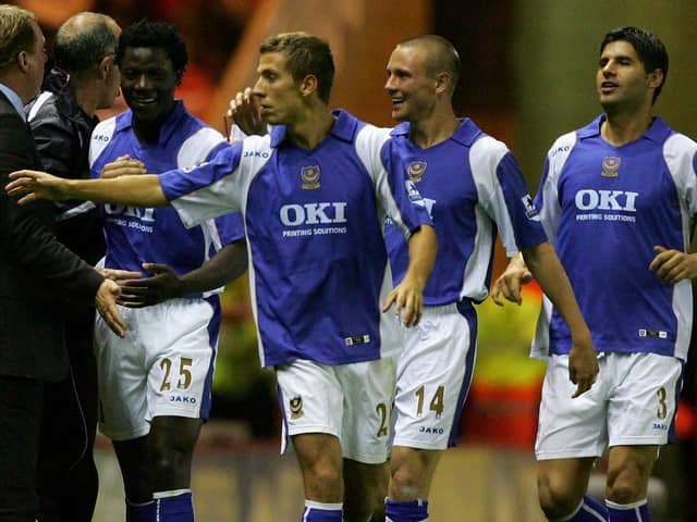 Pompey boss Harry Redknapp, left, with Benjani, Gary O'Neil, Matt Taylor and Dejan Stefanovic.     Picture: Matthew Lewis/Getty Images
