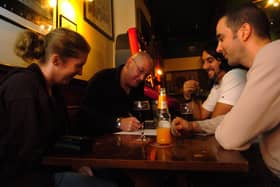 Friends enjoy the pub quiz at the Old Portsmouth pub, from left,  Claire Nobbs, Paul Searle, Mark Booth, and Chris Page (065007-11)