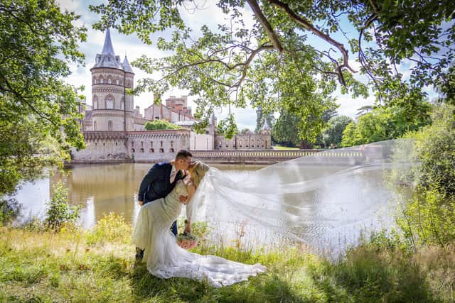 Fairy tale: Bessie Cursons and Ashley Carter seal the big day with a kiss. Picture: Weddings at Carla Mortimer Photography.