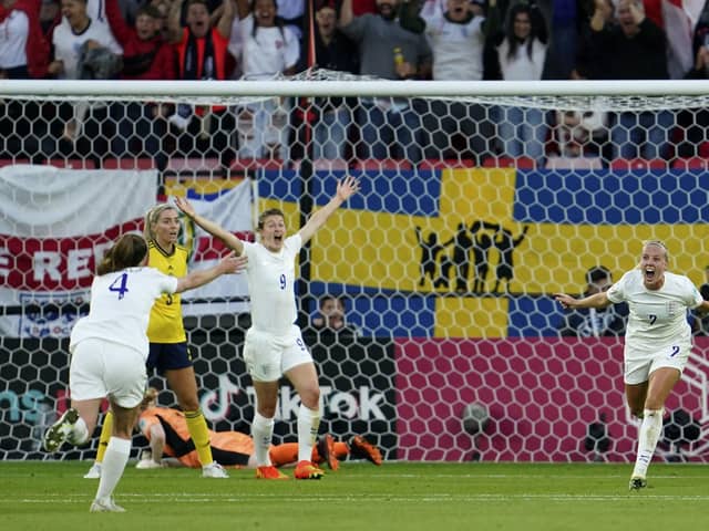 England's Beth Mead, right, after scoring her side's first goal during the Women's Euro 2022 semi final against Sweden on Tuesday. Picture: AP Photo/Jon Super