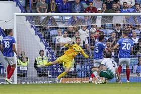 Will Norris pulled off a crucial stoppage-time save to deny Lincoln's Paudie O'Connor a dramatic equaliser. Picture: Jason Brown/ProSportsImages