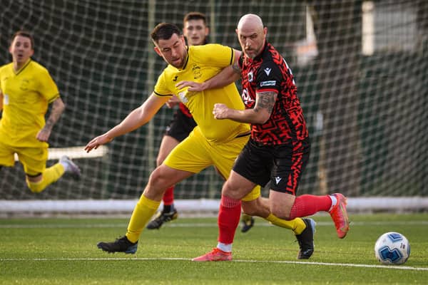 Action from Harvest's 4-1 win at home to Locks Heath (red and black kit) in the Hampshire Premier League. Picture: Keith Woodland (180321-1295)
