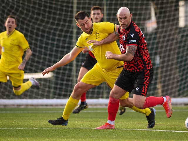Action from Harvest's 4-1 win at home to Locks Heath (red and black kit) in the Hampshire Premier League. Picture: Keith Woodland (180321-1295)