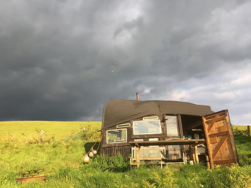 SHED OF THE YEAR 2013, built by Alex Holland
The roof is an upturned boat! It is located at an altitude of 750ft above sea level in the Cambrian Mountain range near Machynlleth in mid Wales. It is full of nautical nonsense befitting a boat turned upside down up a mountain!