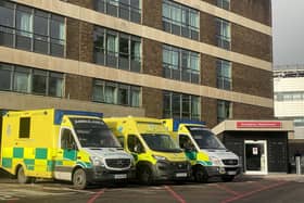 Ambulances are seen outside A&E at Queen Alexandra Hospital on December 31, 2020 in Portsmouth, England. (Photo by Finnbarr Webster/Getty Images)