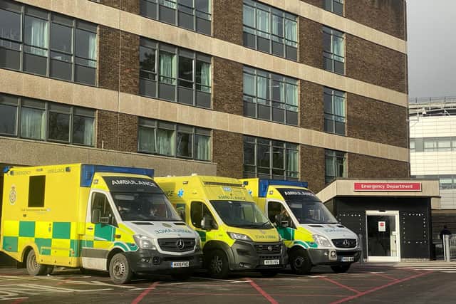 Ambulances are seen outside A&E at Queen Alexandra Hospital on December 31, 2020 in Portsmouth, England. (Photo by Finnbarr Webster/Getty Images)