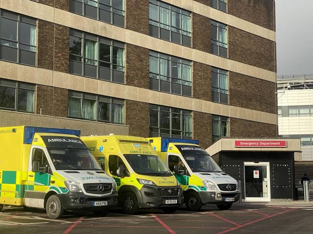 Ambulances are seen outside A&E at Queen Alexandra Hospital on December 31, 2020 in Portsmouth, England. (Photo by Finnbarr Webster/Getty Images)