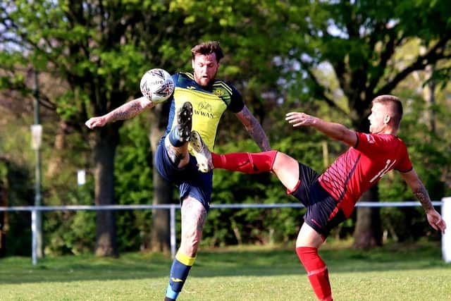 Defender Stanlie Hopkins, left, has signed for Wessex League new boys Fleetlands. Picture by Tom Phillips