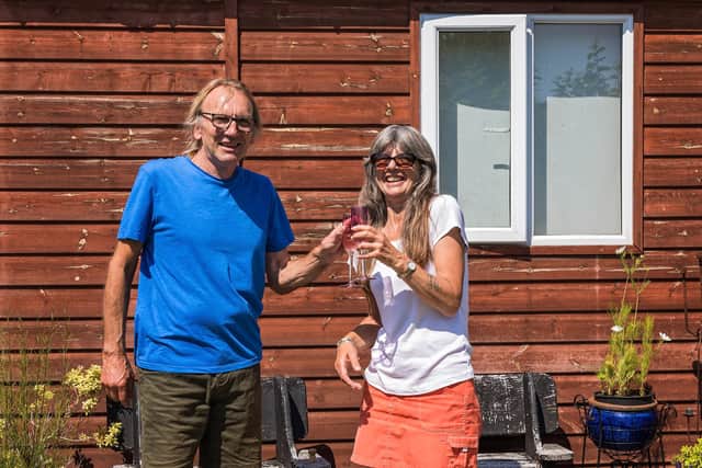 Ian MacLaughlin (68) with wife Jane MacLaughlin (61) celebrating the re-opening of Therapy Room recording studi on on Hayling Island. Picture: Mike Cooter (190721)