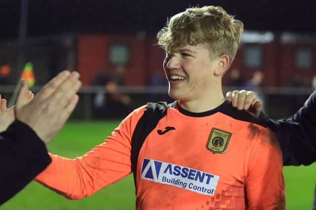 Harry Greenfield is all smiles after his penalty saving heroics at Cams Alders. Picture by Ken Walker.