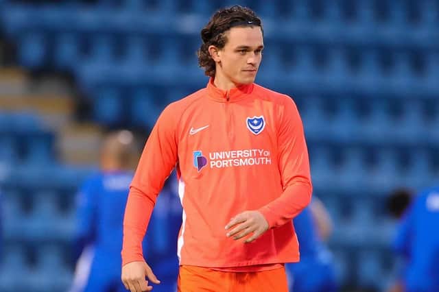 Rasmus Nicolaisen warms up at Gillingham - where he was again an unused substitute. Picture: Nigel Keene