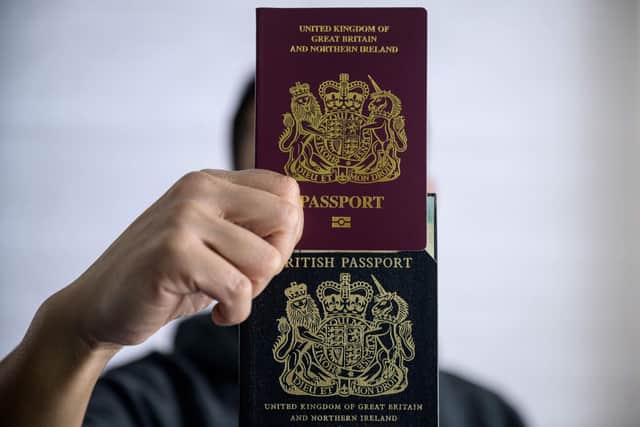 Passport rules every Brit needs to know now. (Photo by ANTHONY WALLACE/AFP via Getty Images)