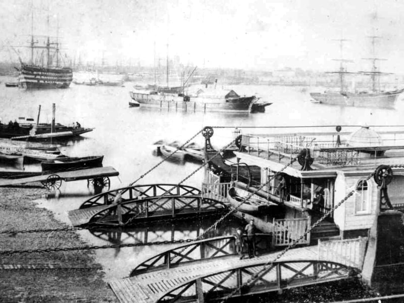 Floating bridge. This is a new angle for the Floating Bridge  and better than we normally see. To the left would be Broad Street leading down to Point and looking out into the harbour can be seen HMS Victory afloat along with numerous other craft which would well in the way of  modern shipping.