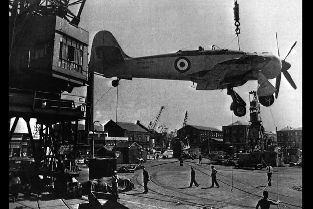 Airborne: This was the last flight of a Sea Fury fighter bomber which served in the Korean War. She was hauled into the air from the deck of  RFA Robert Dundas in Portsmouth Dockyard by crane, before being sailed to Fleetlands, Gosport, as an open day attraction. She would later be transported to Yeovilton Royal Naval Air Station, where she would be placed in the Fleet Air Arm Museum. The News (4026-1)