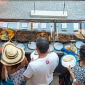 QUEUES: A buffeting in the buffet on a cruise ship Picture: Shutterstock