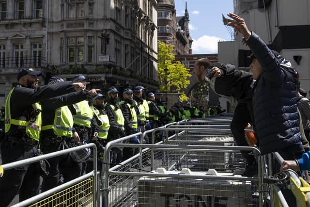 Activists confront police officers on Whitehall. Picture: Dan Kitwood/Getty Images