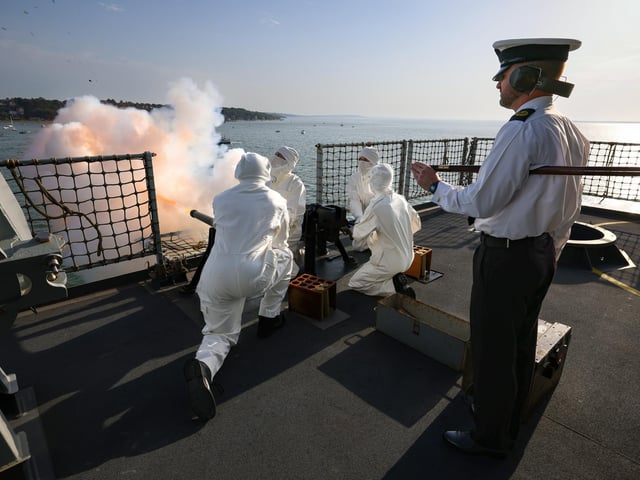 Pictured: The ship's company ceremonial firing party.