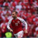 Denmark's midfielder Christian Eriksen runs during the UEFA EURO 2020 Group B football match between Denmark and Finland at the Parken Stadium in Copenhagen on June 12, 2021. (Photo by Friedemann Vogel / various sources / AFP) (Photo by FRIEDEMANN VOGEL/AFP via Getty Images)