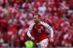 Denmark's midfielder Christian Eriksen runs during the UEFA EURO 2020 Group B football match between Denmark and Finland at the Parken Stadium in Copenhagen on June 12, 2021. (Photo by Friedemann Vogel / various sources / AFP) (Photo by FRIEDEMANN VOGEL/AFP via Getty Images)