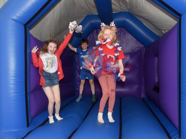 St Columba C of E Primary School in Fareham, celebrated The Queen's Platinum Jubilee. From left: Alanis Matthews (9), Mason Jones (10) and Charlotte Tait (8)