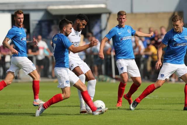 Pompey's Ben Close keeps a close eye on Jonah Ayunga during last summer's pre-season friendly at Westleigh Park. Photo by Dave Haines