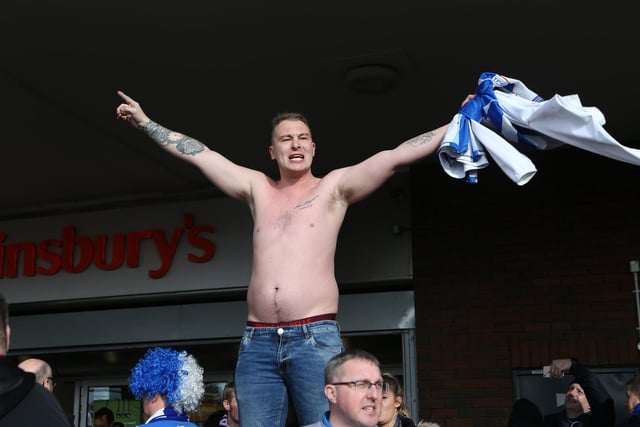 Fan takes off his shirt ahead of the Hartlepool United game with Crystal Palace.