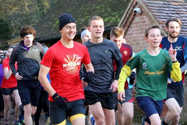 Friendly competition between runners at the start of Havant Parkrun at Staunton Country Park