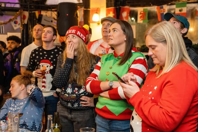 England fans with eyes glued to the screens at The Kings in Southsea, on Saturday, December 10, watching England v France. Picture: Matthew Clark
