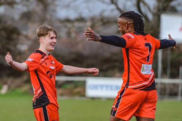 AFC Portchester's Rafa Ramos, right, celebrates another goal with young Harvey Aston Picture: Daniel Haswell