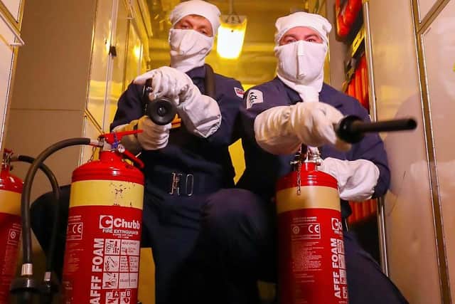 Members HMS Montrose's Starboard crew practise their firefighting skills on HMS Monmouth prior to flying out and taking a handover from the Port crew currently in the Gulf. Photo: Royal Navy