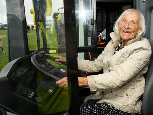 Pictured is: Joan Spencer-Lane takes over as driver.


Picture: Keith Woodland
