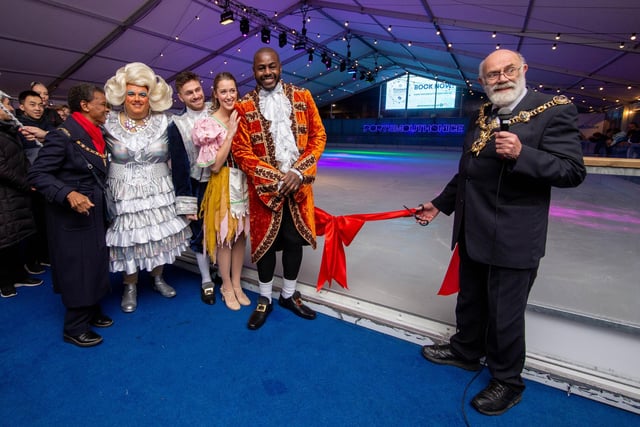 Lord Mayor Hugh Mason cuts the ribbon to officially open the ice rink with The Kings Theatre's panto stars