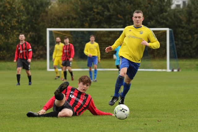 Action from Meon Milton's 5-2 Mid-Solent League win over Rowner (red). Picture by Kevin Shipp