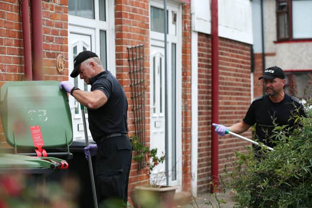Police searching near the scene. Aftermath of fire at Grange Crescent, Gosport. Picture: Chris Moorhouse (310719-86)