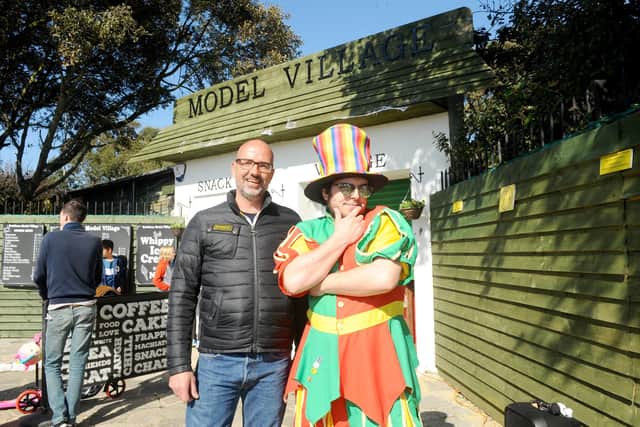 Mark Wilson, owner of Southsea Model Village with Leto Kitchen known as Sylvester the balloon jester.

Picture: Sarah Standing (020421-6028)