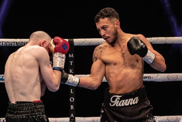 Mikey McKinson, right, during one of his 19 professional wins. Picture: MTK Global