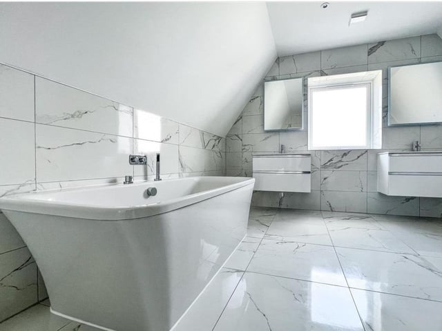 This property comes with four bedrooms, two bathrooms and three reception rooms.