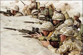 British soldiers from the First Stafford, well known as the 'Desert Rats', stand in a trench on January 6, 1991. Picture: PATRICK BAZ/AFP via Getty Images