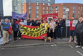 Members of different unions, workers, and Labour councillors stand shoulder to shoulder on the picket line at Fratton station on the first day of the RMT rail strike. Picture: Emily Jessica Turner