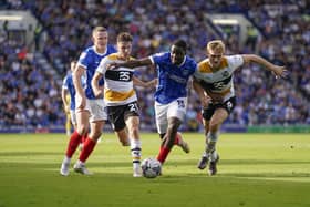Christian Saydee attempts to drive Pompey forward against Port Vale. Picture: Jason Brown/ProSportsImages